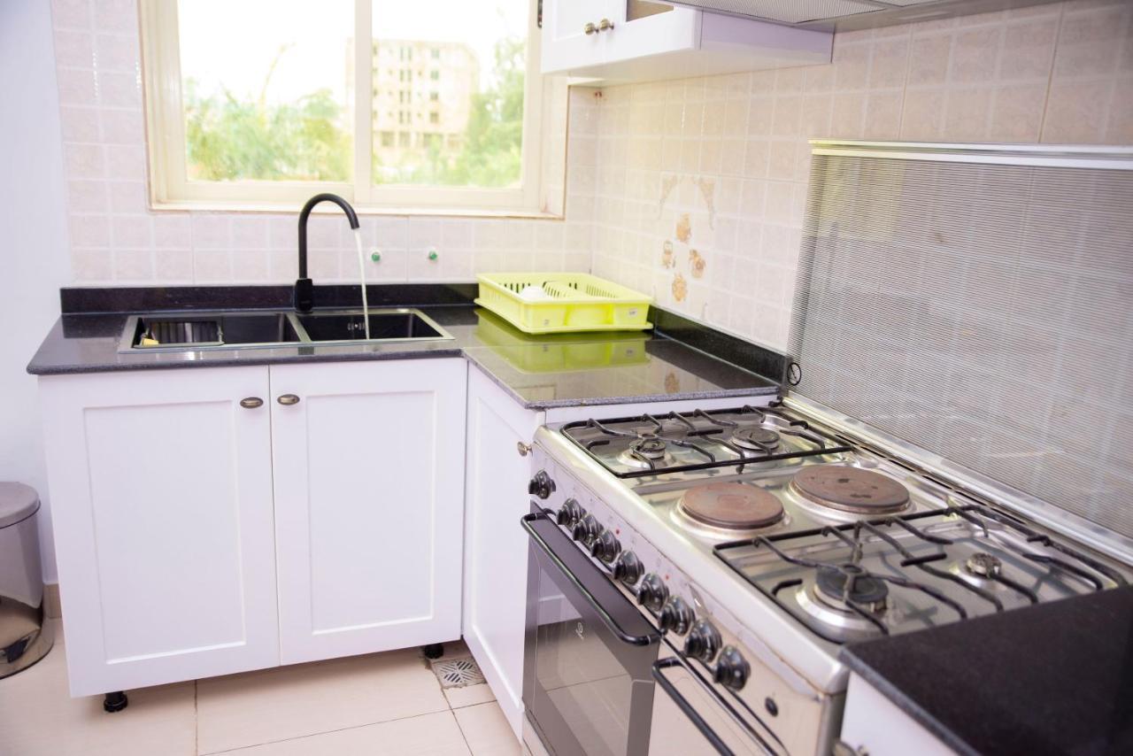 Grazia Apartment Hotel Кигали Экстерьер фото